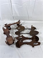 Lot of Antique Ice Skates and roller skates