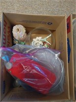 box of glasses, figures and Girl Scout items
