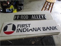 v-rod alley sign & 1st natl bank sign
