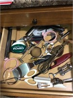 contents of drawer - scissors, bottle opener etc
