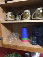 contents of kitchen cabinet cups & glasses