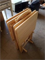 Set of 4 wooden tv trays. Good condition.