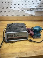 Battery charger in sander