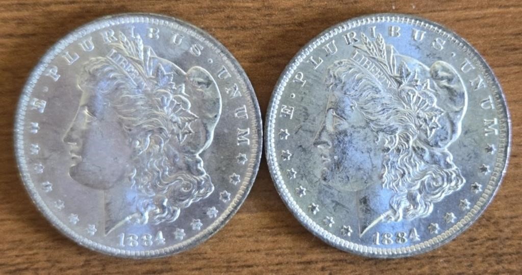 (2) 1884-O Morgan Dollars