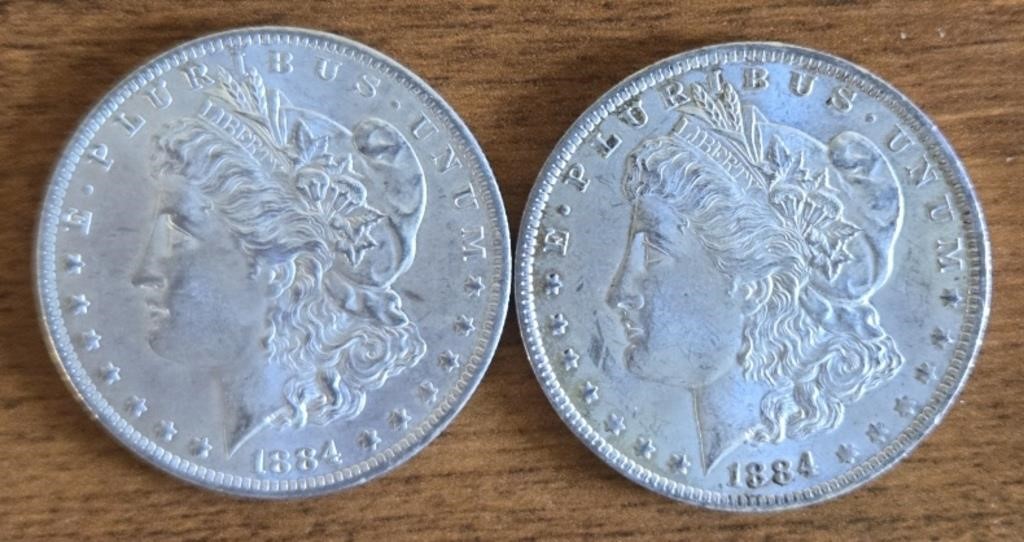 (2) 1884-O Morgan Dollars