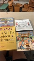 Lot of the peanuts books and a Charlie Brown