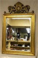 Gilt Italian Cartouche Crowned Beveled Mirror.