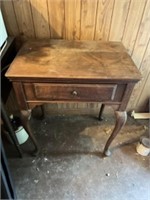 Old sewing machine cabinet. Cabinet only. Machine