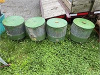 Four antique John Deere planter boxes