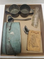 Tin cups, metal bin with handles, glass mouse