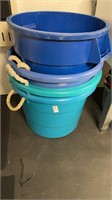 Horse feed buckets and one rubbermaid trash can