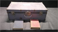 ANTIQUE TRUNK WITH BOOKS