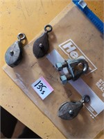 3 small pulleys and wire clamp
