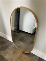 Modern gold tone hall mirror