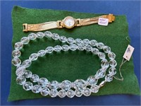 AVON Clear beaded necklace, and new women’s wrist