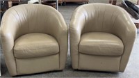 2 Faux Leather Swivel Barrel Chairs