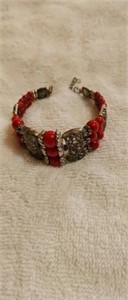 This bracelet made by hand 6" around