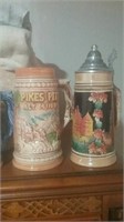 Group of four beer steins