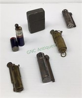Vintage butane lighters include military.
