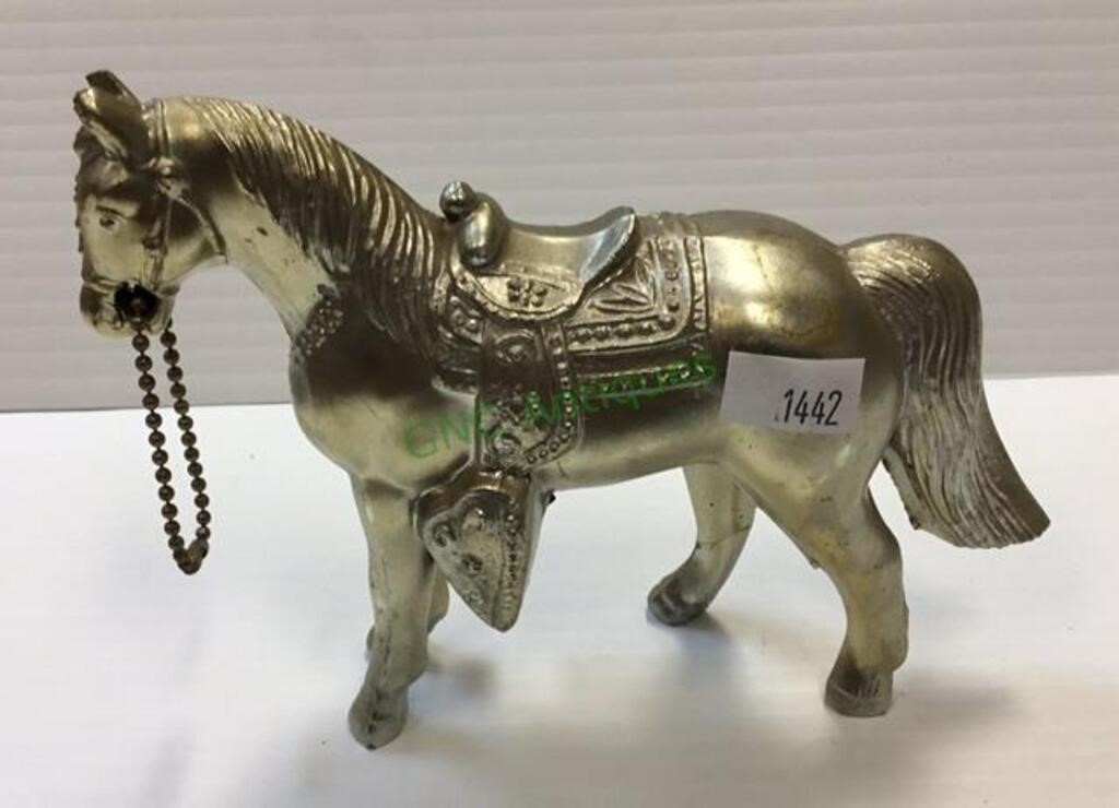 Vintage gold tone metal cast horse measuring 4