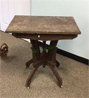 Marble top table on caster wheels - top is marble