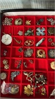 Tray of jewelry