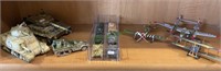 Group of metal toys, tanks, planes, various small