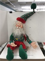 The North Pole Village Santa Doll