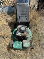 PowerBloc commercial mower. Engine appears to be