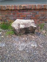 Rock in Front of Store