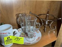 Decorative items including misc coffee cups, egg o