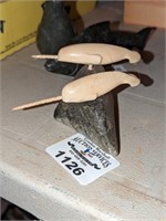 Two Ivory Narwhales on soapstone