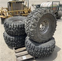Set of (4) 35x14.5015LT114p Pick-Up Tires and Rims
