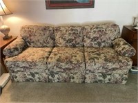 Floral sofa. Measures 7 foot. Lane