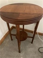 Side table measures19 inches in diameter and 27