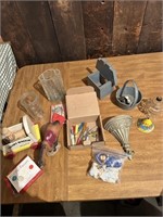 small screwdrivers, shelf, jar, metal basket,