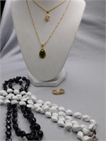 Necklaces: white - black - goldtone pendant with