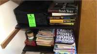 Assorted books, word puzzle books, and carry bag