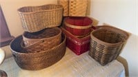 Group of eight baskets, including a large handled