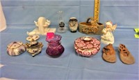 bookends, cranberry vase, baby shoes, etc