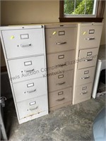 3 four-drawer metal filing cabinets