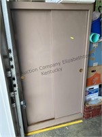 Metal closet cabinet approximate 5 feet tall by