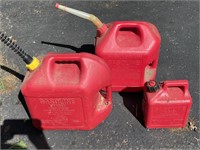 2 Five Gallon and 1 One Gallon Gas Cans