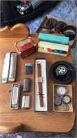 Harmonica (2), lighters, Camel watch, game chips