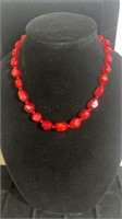 Shorter length red lucite beaded necklace