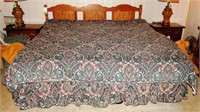 King size bed with comforter, pillows, sheets
