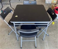 J - FOLDING TABLE W/ 4 CHAIRS (G24)