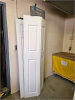 29 1/2 X 79  MASONITE BI - FOLD  CLOSET DOOR.