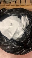 2 lg garbage bags with white tablecloths and