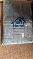 Bath rug still in package